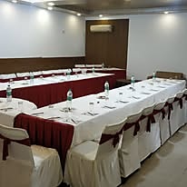 Meeting hall with a U-shaped table arrangement